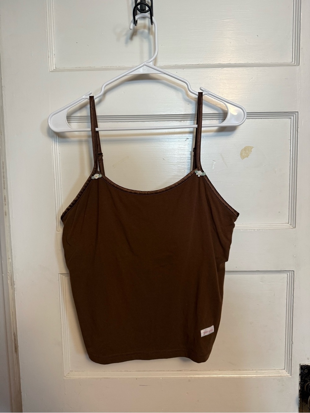 Brown tank top w/adjustable straps, built-in bra, and floral details Size Medium